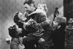 Donna Reed and Jimmy Stewart in It's a Wonderful Life. Donna Reed and Jimmy Stewart in It's a Wonderful Life.
