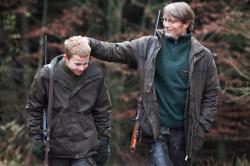 Lasse Fogelstrom and Mads Mikkelsen in The Hunt