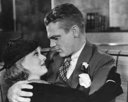 Bette Davis and James Cagney get close in Jimmy the Gent.