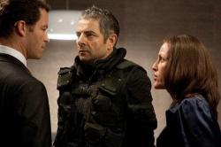 Dominc West, Rowan Atkinson and Gillian Anderson in Johnny English Reborn. Dominc West, Rowan Atkinson and Gillian Anderson in Johnny English Reborn.