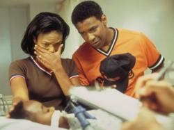 Kimberly Elise and Denzel Washington in John Q.. Kimberly Elise and Denzel Washington in John Q..