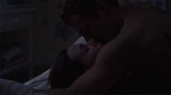 Embeth Davidtz  and Alessandro Nivola as Madeleine and George communicating with each other the only way they know how in Junebug