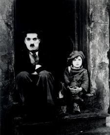 Charlie Chaplin and Jackie Coogan in The Kid.