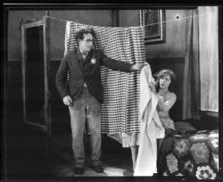 Harold Lloyd happens one night to offer shelter to Jobyna Ralston in The Kid Brother.