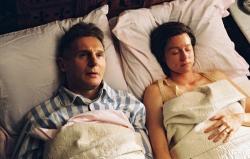 Liam Neeson and Laura Linney in Kinsey. Liam Neeson and Laura Linney in Kinsey.