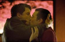 Downey jr. and Val Kilmer share a kiss as Harry and Perry. Downey jr. and Val Kilmer share a kiss as Harry and Perry.
