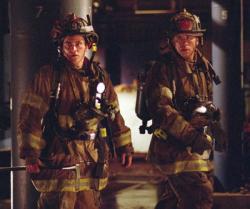 Joaquin Phoenix and John Travolta in Ladder 49.