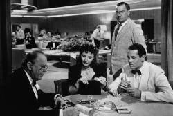 Charles Coburn, Barbara Stanwyck, William Demarest and Henry Fonda in The Lady Eve.