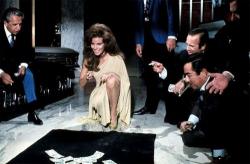 Raquel Welch shoots craps in Lady in Cement.