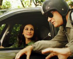 Julia Roberts and Tom Hanks in Larry Crowne. Julia Roberts and Tom Hanks in Larry Crowne.