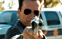 He's back! Arnold Schwarzenegger takes aim in The Last Stand.