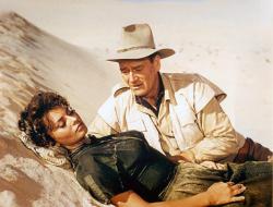 Sophia Loren and John Wayne in Legend of the Lost.