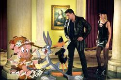 Elmer Fudd, Bugs Bunny, Brendan Fraser and Jenna Elfman in Looney Tunes: Back in Action.