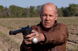 Bruce Willis in Looper Bruce Willis in Looper