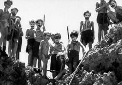 British school boys become savages in Lord of the Flies.