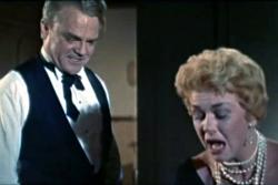 James Cagney and Doris Day argue. 