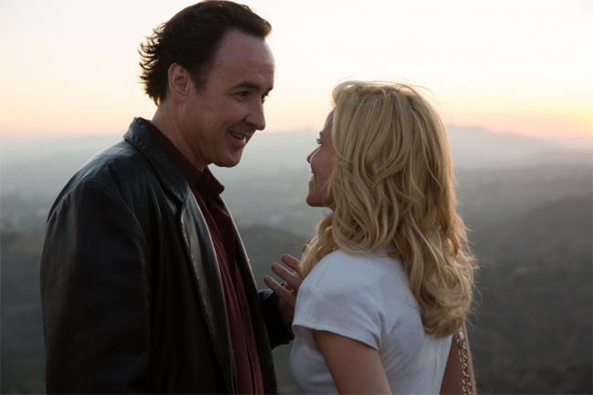 John Cusack and Elizabeth Banks in Love & Mercy John Cusack and Elizabeth Banks in Love & Mercy
