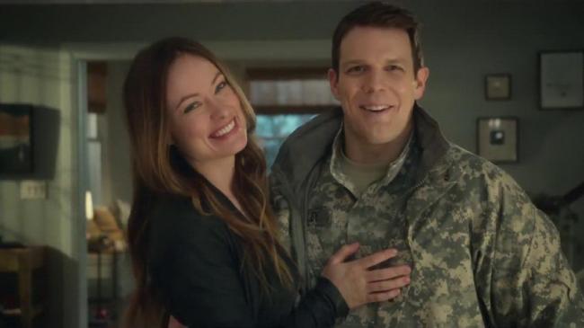 Olivia Wilde and Jake Lacy in Love the Coopers