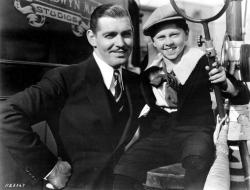 Clark Gable poses with Mickey Rooney, who played his younger self, in Manhattan Melodrama.