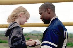 Dakota Fanning and Denzel Washington in Man on Fire. Dakota Fanning and Denzel Washington in Man on Fire.