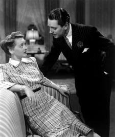 Bette Davis and Reginald Gardiner. Bette Davis and Reginald Gardiner.