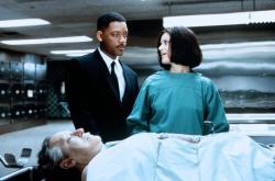 Will Smith and Linda Fiorentino in Men in Black. Will Smith and Linda Fiorentino in Men in Black.