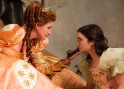 Julia Roberts and Lily Collins in Mirror Mirror. Julia Roberts and Lily Collins in Mirror Mirror.