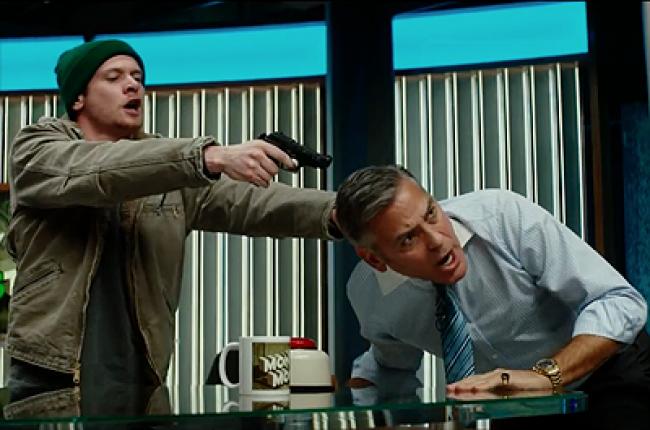 Jack O'Connell and George Clooney in Money Monster. Jack O'Connell and George Clooney in Money Monster.