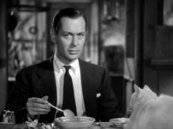 Robert Montgomery and a cat in Mr. & Mrs. Smith.