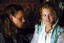 Justin Chambers and Mena Suvari in The Musketeer.