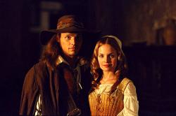 Justin Chambers and Mena Suvari in The Musketeer. Justin Chambers and Mena Suvari in The Musketeer.