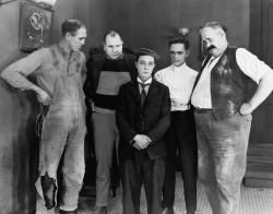 Buster Keaton meets his wife's relations. Buster Keaton meets his wife's relations.