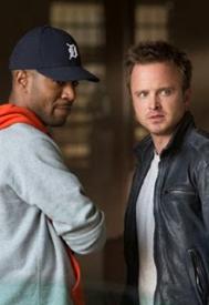 Scott Mescudi and Aaron Paul in Need for Speed