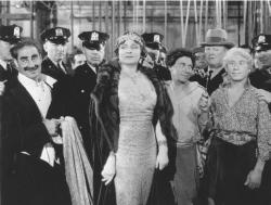 Groucho, Chico and Harpo with the unflappable Margaret Dumont. Groucho, Chico and Harpo with the unflappable Margaret Dumont.