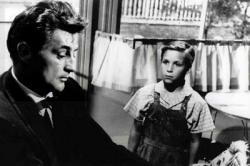 Robert Mitchum and Billy Chapin in The Night of the Hunter