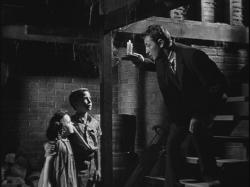 Sally Jane Bruce, Billy Chapin and Robert MItchum in The Night of the Hunter.