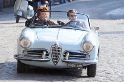 Sophia Loren and Daniel Day-Lewis drive through the streets of Rome.