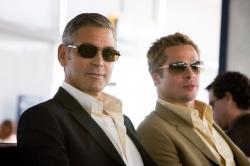 George Clooney and Brad Pitt in Ocean's Thirteen. George Clooney and Brad Pitt in Ocean's Thirteen.