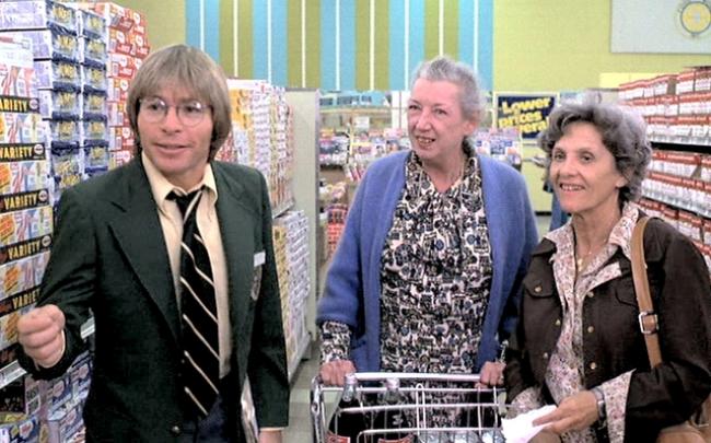 John Denver, with Connie Sawyer on the right, in Oh, God! John Denver, with Connie Sawyer on the right, in Oh, God!