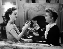Bette Davis and Miriam Hopkins in Old Acquaintance. Bette Davis and Miriam Hopkins in Old Acquaintance.