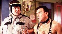 John Goodman and Paul Reiser in One Night at McCool's. John Goodman and Paul Reiser in One Night at McCool's.