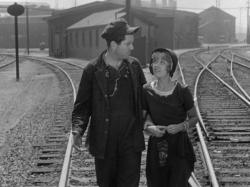 Grant Withers and Joan Blondell in Other Men's Women,/i>