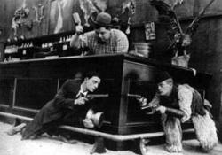 Roscoe (Fatty) Arbuckle, Buster Keaton and Al St. John in Out West. Roscoe (Fatty) Arbuckle, Buster Keaton and Al St. John in Out West.