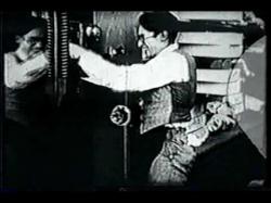 Harold Lloyd as a tailor in Over the Fence. Harold Lloyd as a tailor in Over the Fence.
