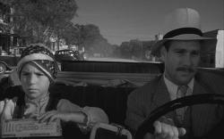 Tatum and Ryan O'Neal in Paper Moon. Tatum and Ryan O'Neal in Paper Moon.