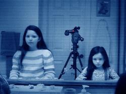 Chloe Csengery and Jessica Tyler Brown in a scene that appeared in the trailer, but never made the finished  Paranormal Activity 3.