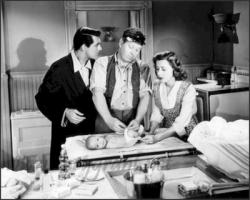 Cary Grant, Edgar Buchanan and Irene Dunne in Penny Serenade.