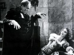 Lon Chaney and Mary Philbin ham it up in The Phantom of the Opera.