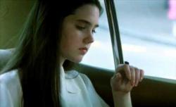 Jennifer Connelly and her pet fly in Phenomena. Jennifer Connelly and her pet fly in Phenomena.