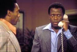 Bill Cosby and Sidney Poitier in A Piece of the Action. Bill Cosby and Sidney Poitier in A Piece of the Action.